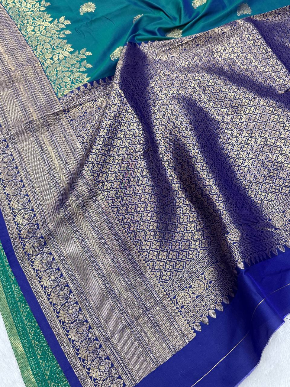 Blue Premium Kanijivaram  Soft Silk Sarees with Copper zari jaal having rich zari woven pallu and paired with Plain running Blouse
