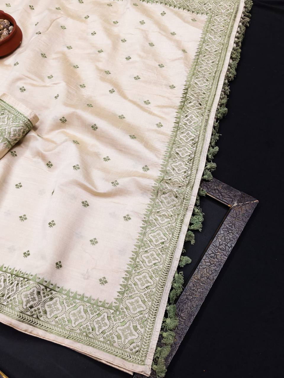 Pure Tussar Saree with all over the multi thread embroidery work and piping border.