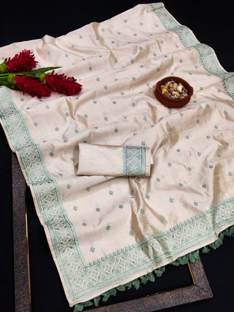 Pure Tussar Saree with all over the multi thread embroidery work and piping border.