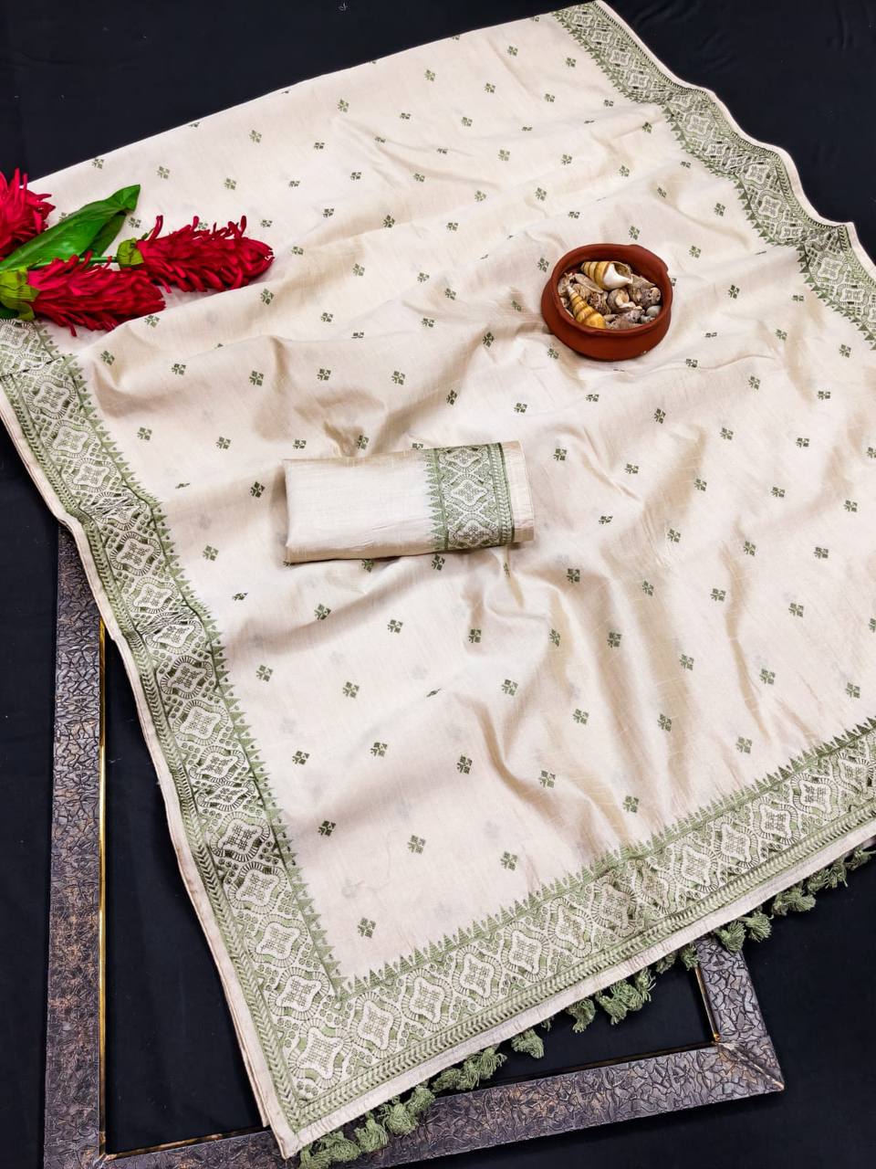 Pure Tussar Saree with all over the multi thread embroidery work and piping border.