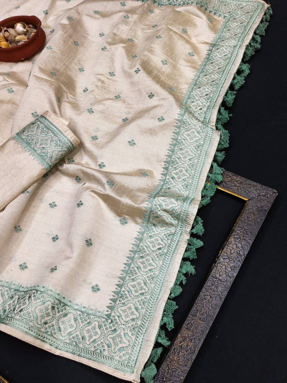 Pure Tussar Saree with all over the multi thread embroidery work and piping border.