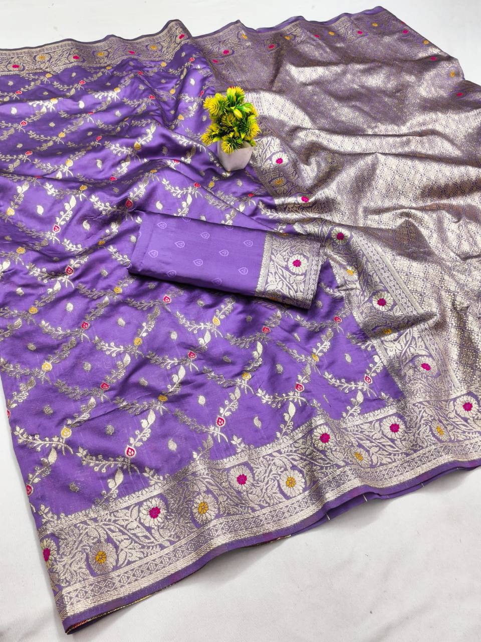 PURPUL FANCY BANARASI SILK FLOWERS AND MINA WITH WEAVING ZARI RICH PALLU AND BORDER WORK SAREE WITH UNSTITCHED BLOUSE