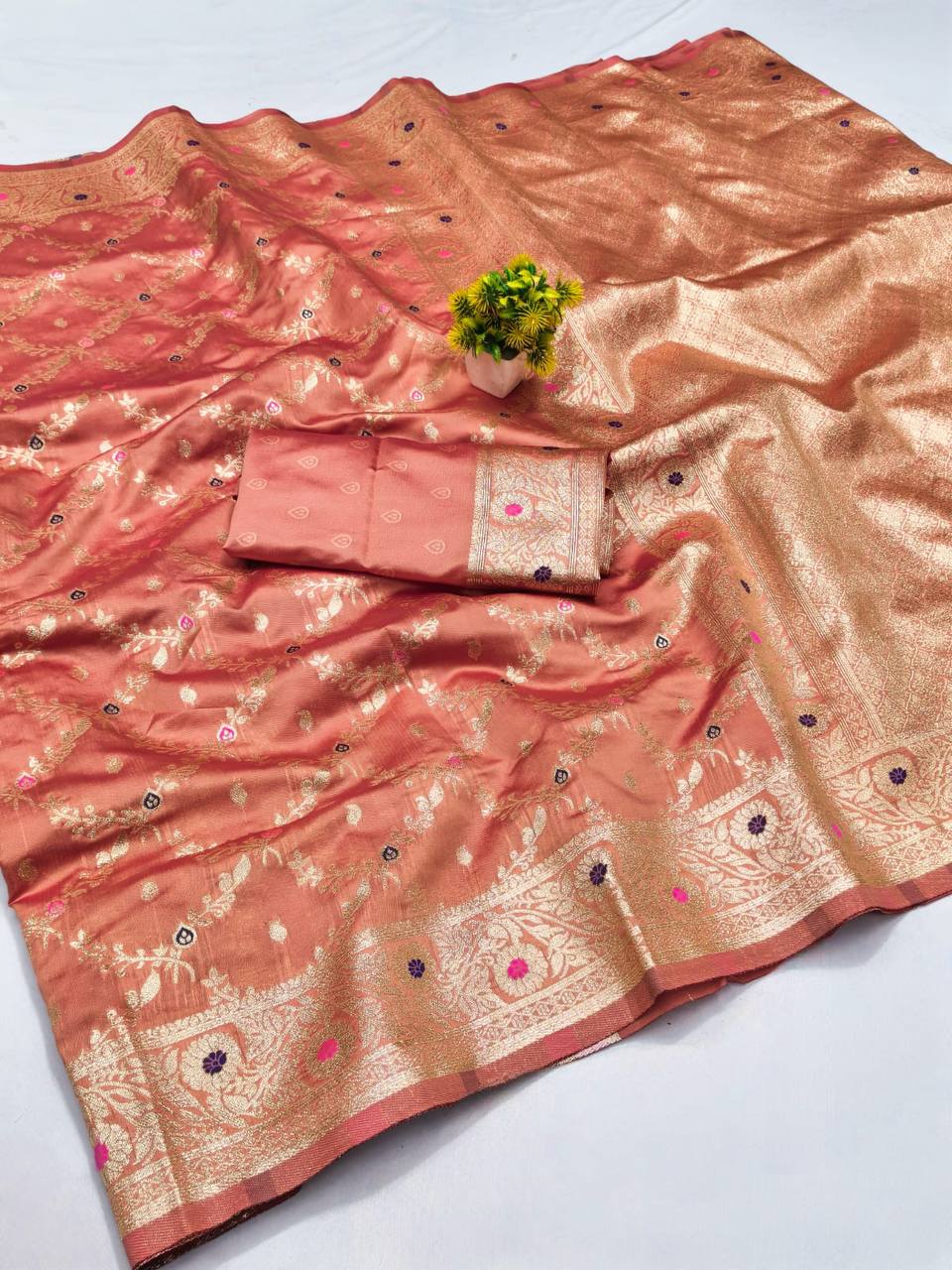 ORANGE FANCY BANARASI SILK FLOWERS AND MINA WITH WEAVING ZARI RICH PALLU AND BORDER WORK SAREE WITH UNSTITCHED BLOUSE