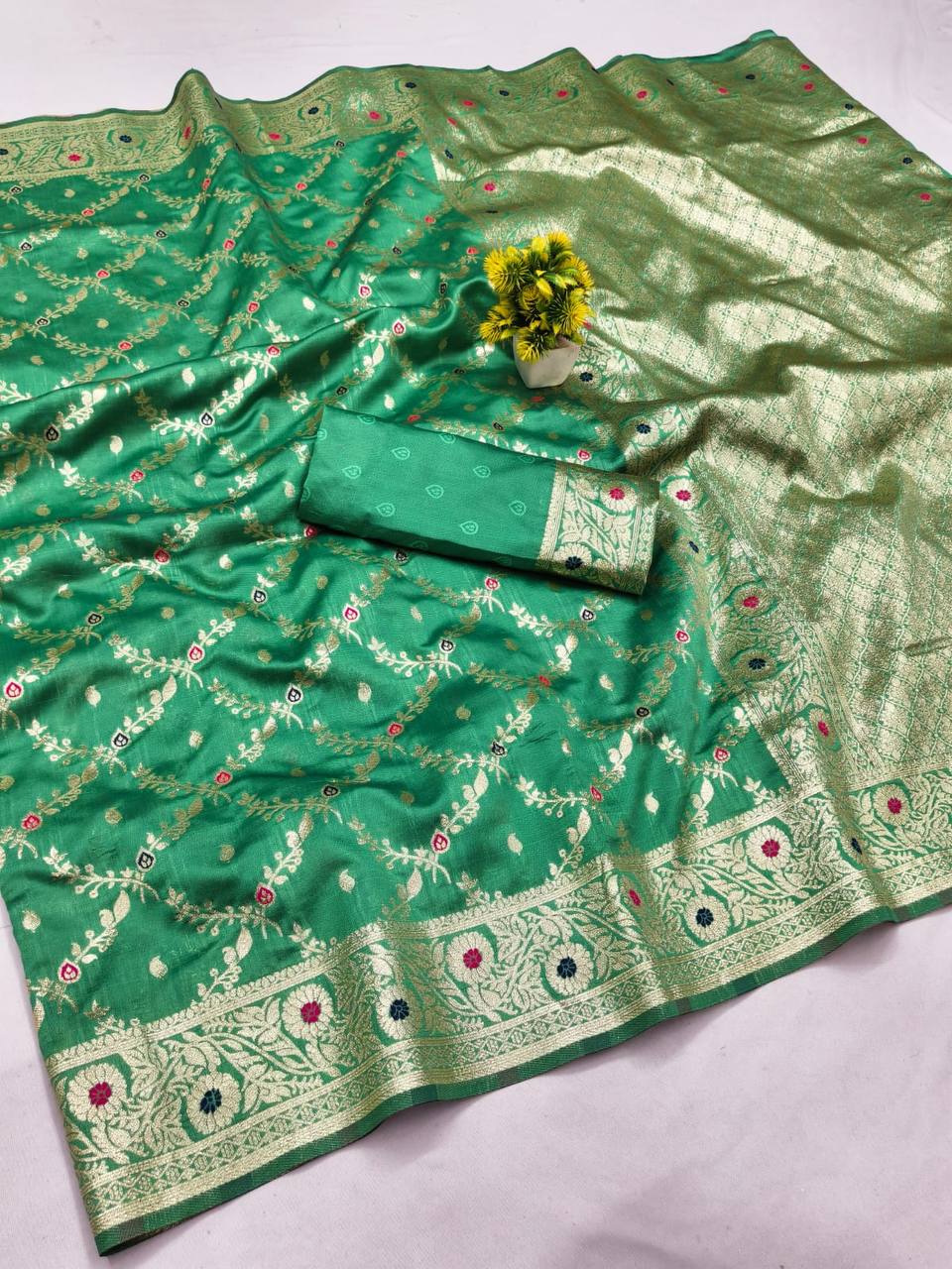 SEA GREEN  FANCY BANARASI SILK FLOWERS AND MINA WITH WEAVING ZARI RICH PALLU AND BORDER WORK SAREE WITH UNSTITCHED BLOUSE