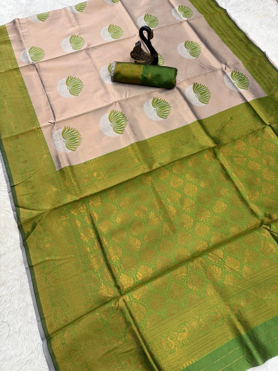 Inspiring Beige and Green Soft Silk Saree With Murmurous Blouse Piece