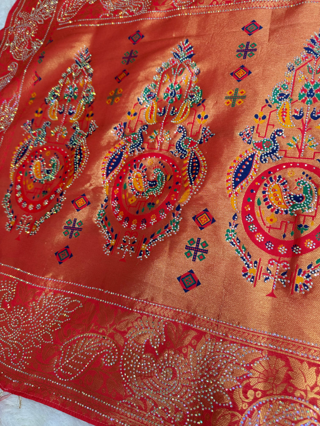 Red Festive Saree with Heavy Zari Work and Traditional Artistic Border