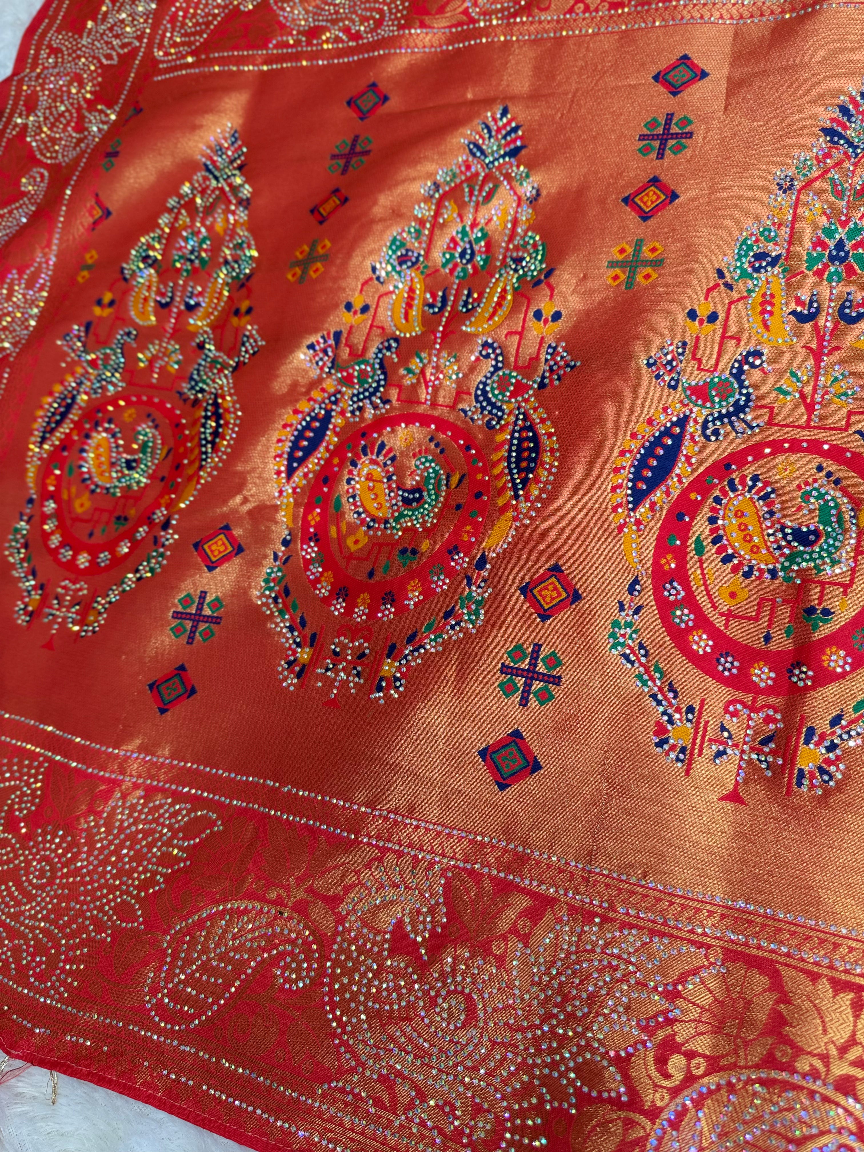 Red Festive Saree with Heavy Zari Work and Traditional Artistic Border