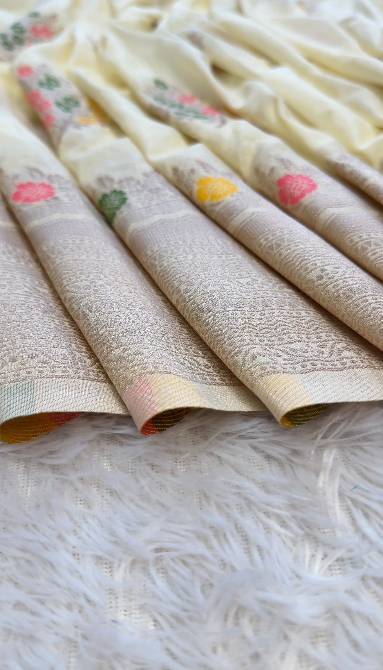 Pastel Yellow Festive Saree with Multicolor Floral Work and Elegant Pallu Tassels