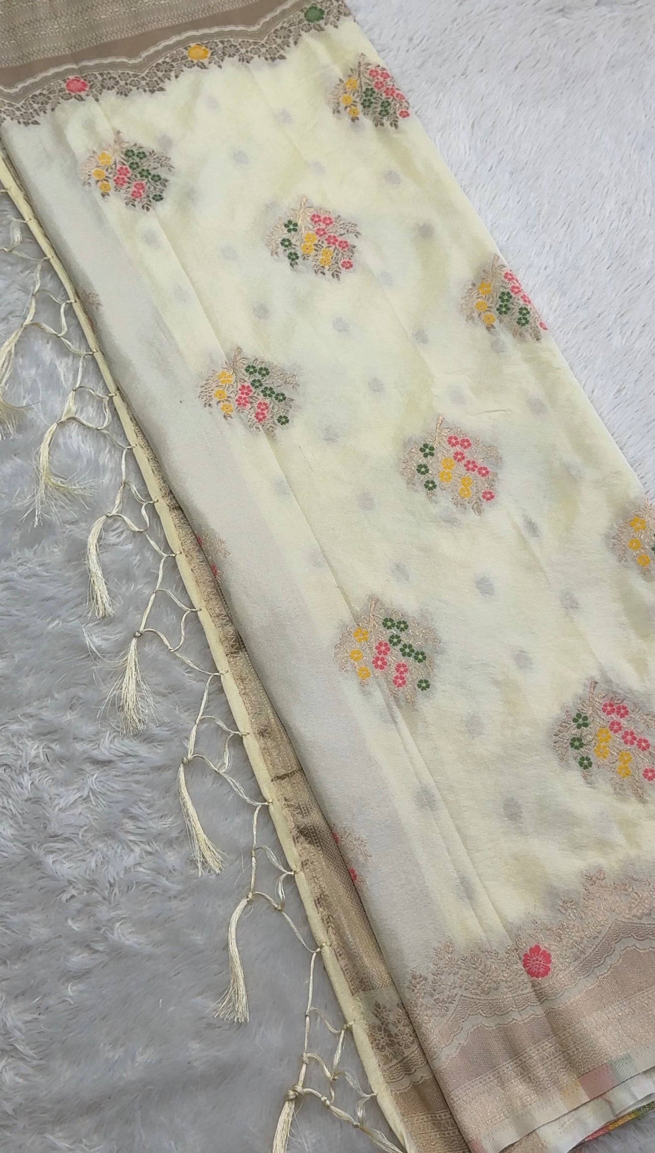 Pastel Yellow Festive Saree with Multicolor Floral Work and Elegant Pallu Tassels