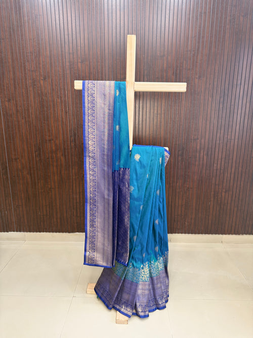 Elegant Teal Blue Banarasi Saree with Antique Gold Zari Border
