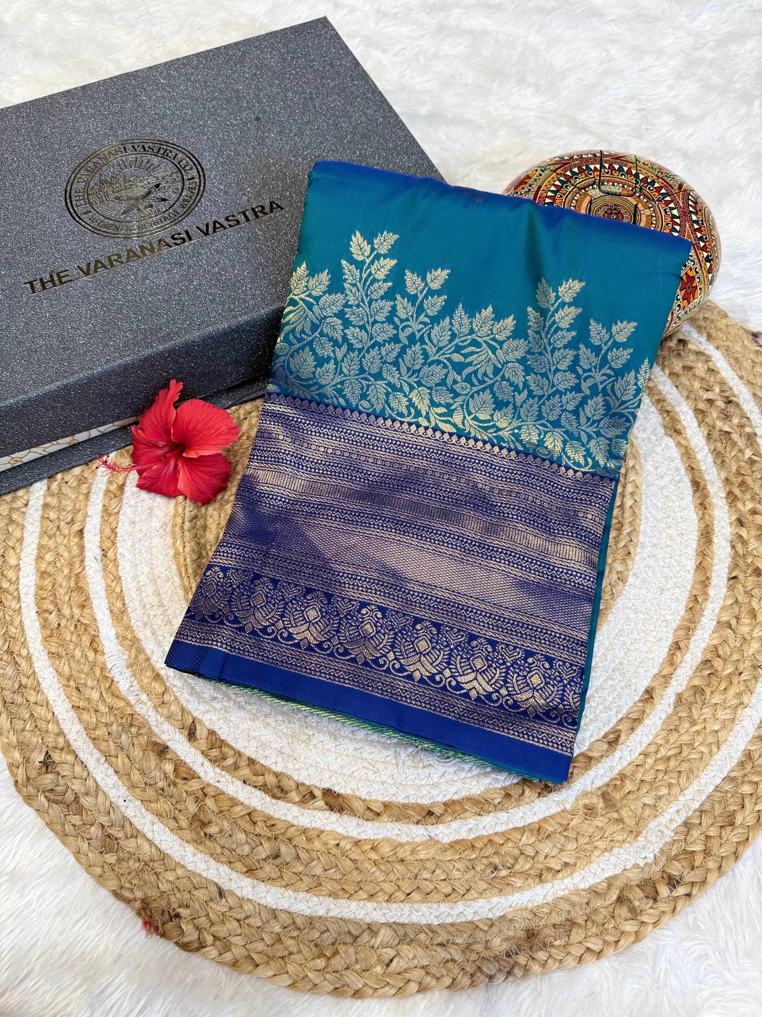 Elegant Teal Blue Banarasi Saree with Antique Gold Zari Border