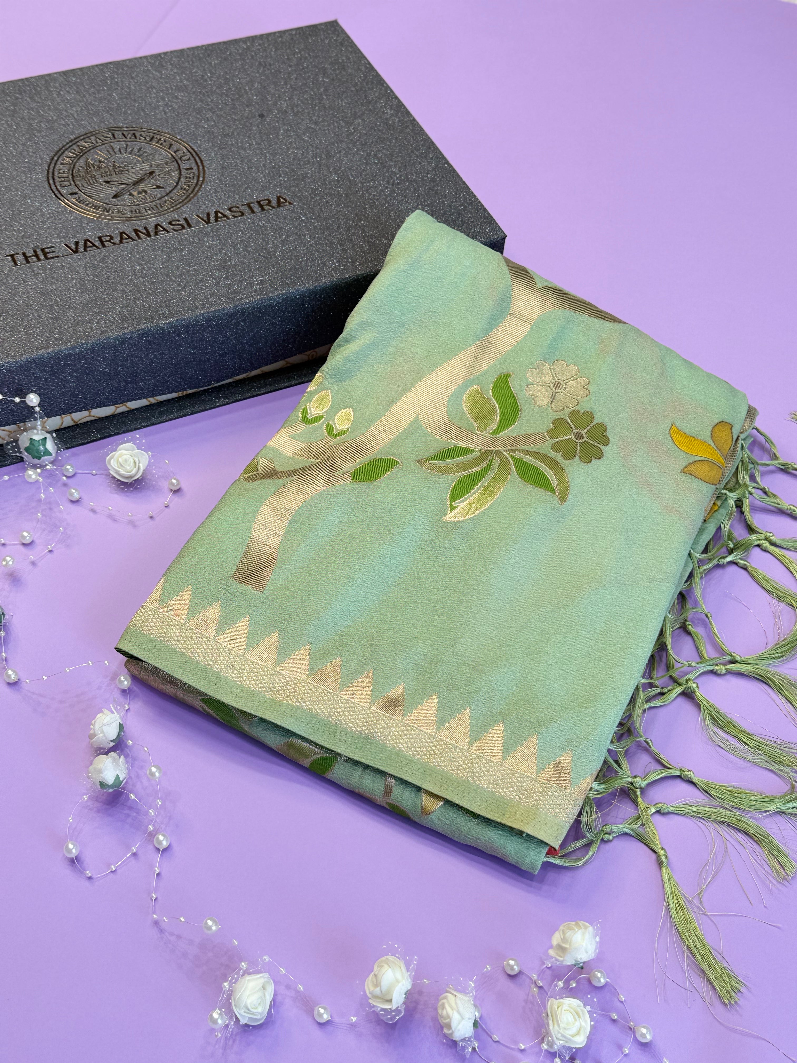 Luxury Mint Green Festive Saree with Intricate Gold Brocade Work