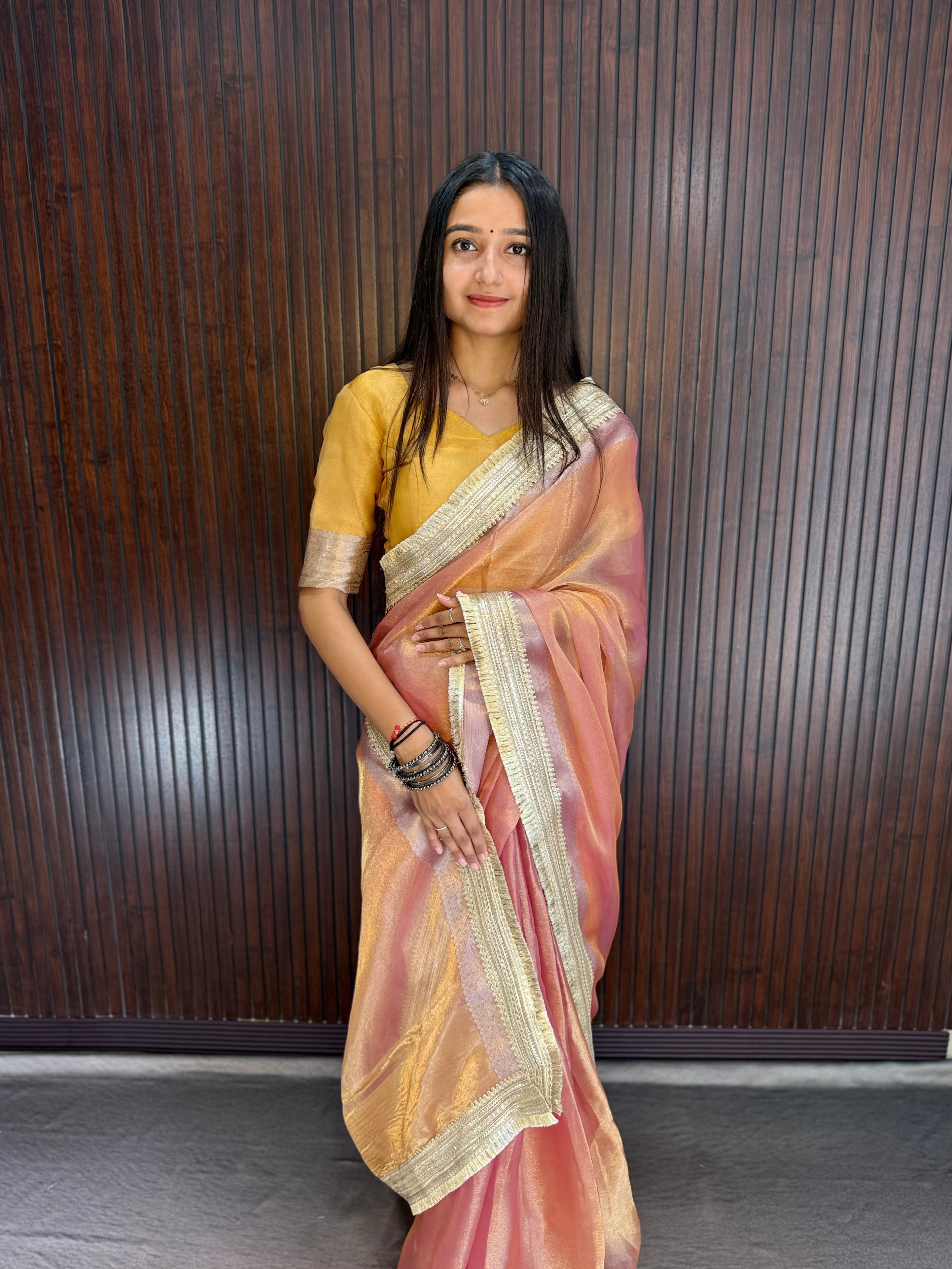 Suvarna - Luminous Tissue Saree with Designer Blouse
