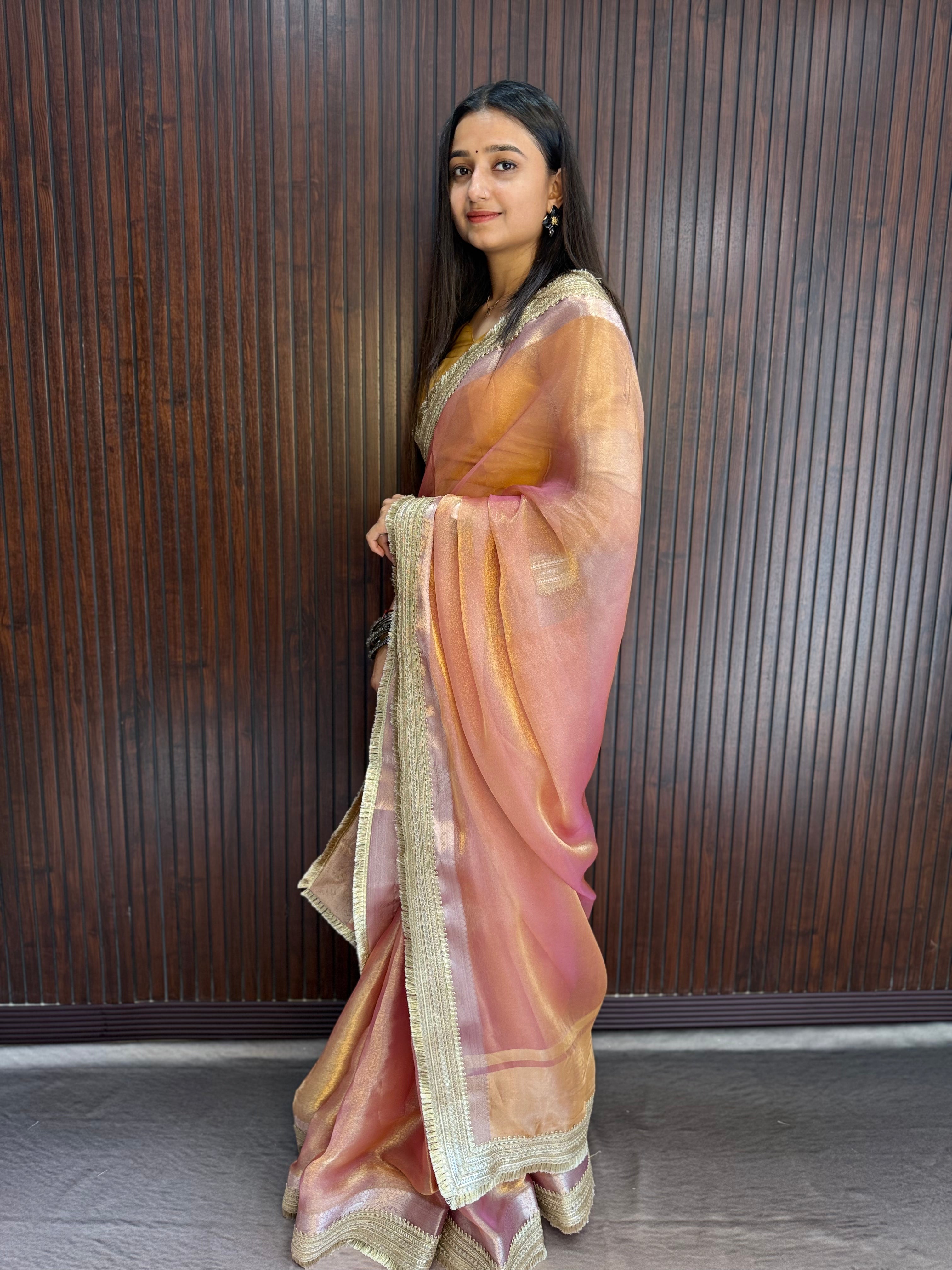 Suvarna - Luminous Tissue Saree with Designer Blouse