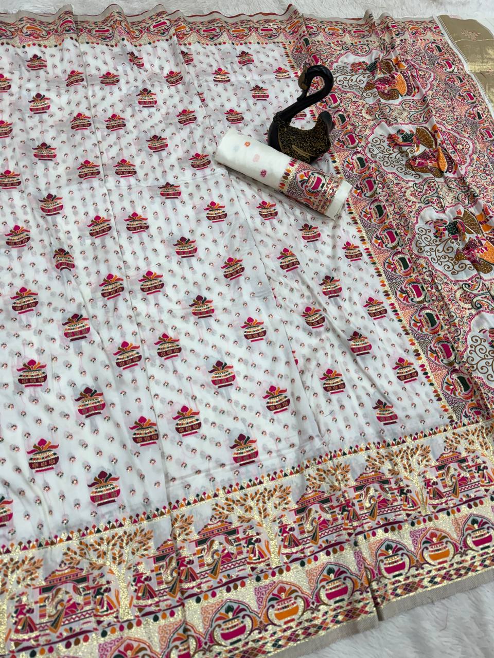 Premium White Embroidered Festive saree with Colorful Traditional Motifs & Detailed Border Work