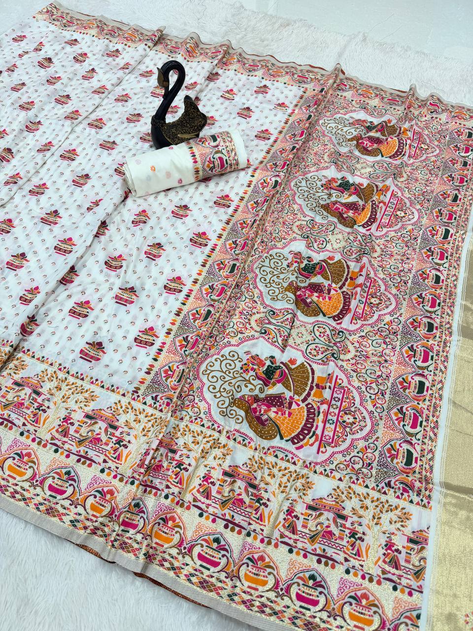 Premium White Embroidered Festive saree with Colorful Traditional Motifs & Detailed Border Work