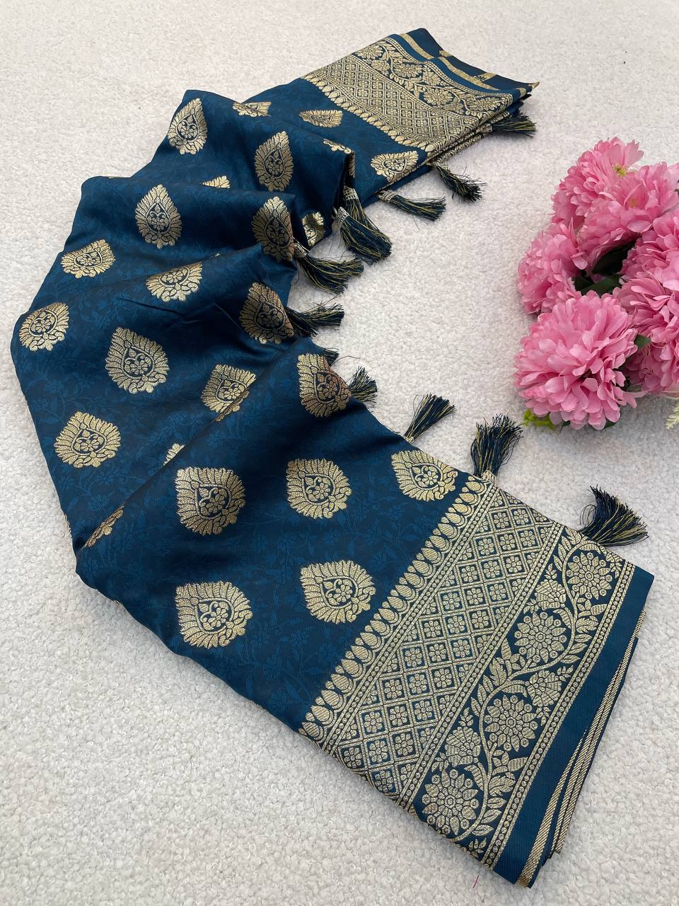 Premium Banarasi Soft Silk Sarees with Golden zari Buti weaves all over the body, having rich zari woven pallu and paired with BUTI WORK running Blouse