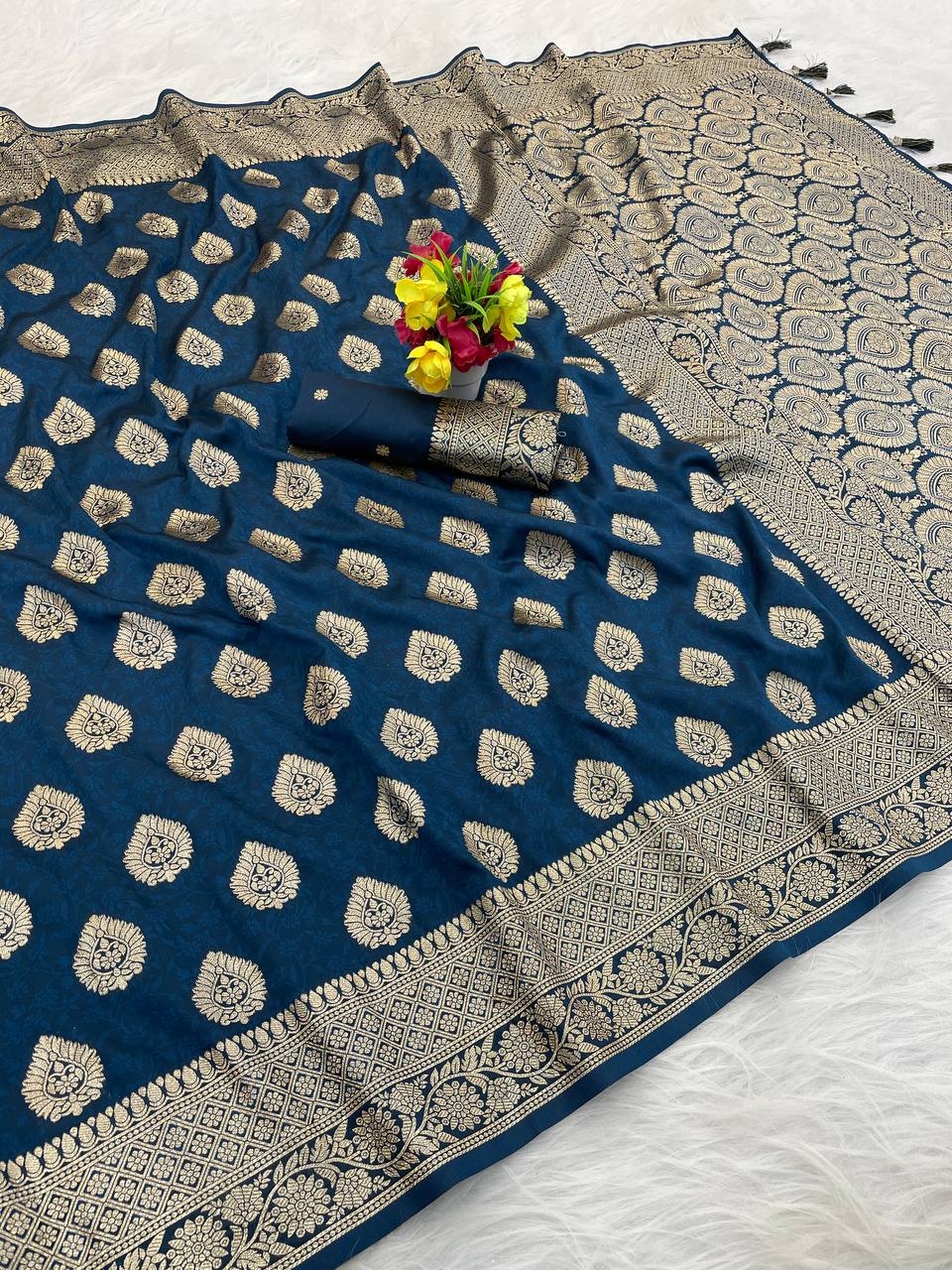 Premium Banarasi Soft Silk Sarees with Golden zari Buti weaves all over the body, having rich zari woven pallu and paired with BUTI WORK running Blouse