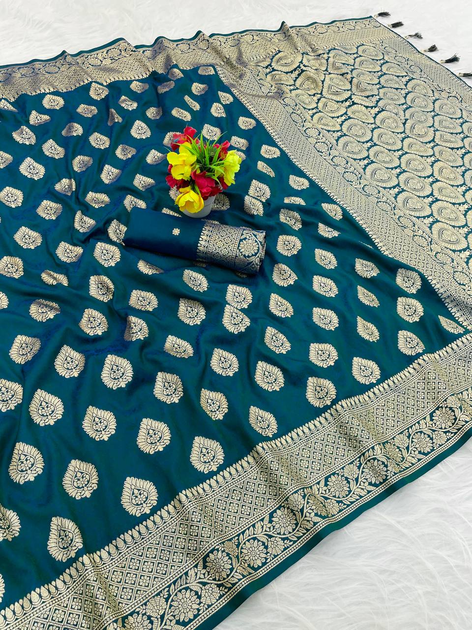 Premium Banarasi Soft Silk Sarees with Golden zari Buti weaves all over the body, having rich zari woven pallu and paired with BUTI WORK running Blouse