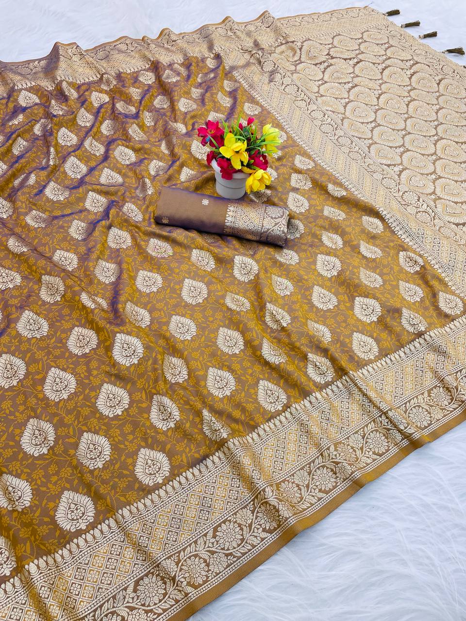 Premium Banarasi Soft Silk Sarees with Golden zari Buti weaves all over the body, having rich